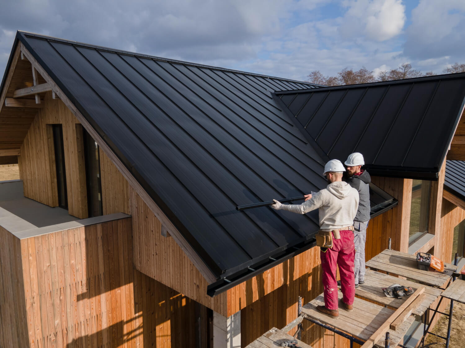 ABC Builders roofing crew working on a client's roof in Northern California